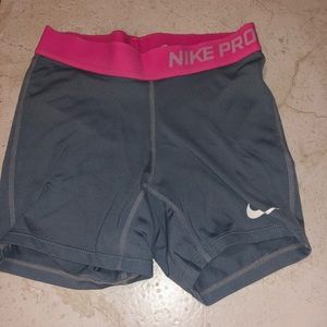 Gray Nike Pros With Pink Band